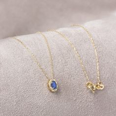 "Sapphire represents commitment in love. Our oval cut sapphire necklace surrounded by 14k solid gold diamonds is an elegant jewel for you and your loved ones with its elegant design. Time to pamper yourself and your loved ones. The color of those born in September is the color of sapphire. Our ring compatible with our necklace: https://queenjewelryturkey.etsy.com/listing/1562024493/oval-sapphire-ringreal-diamond-14k-solid?utm_source=Copy&utm_medium=ListingManager&utm_campaign=Share&utm_term=so.l Gift Sapphire Diamond Cut Necklace, Sapphire Diamond Necklace Fine Jewelry Gift, Sapphire Diamond Necklace As A Fine Jewelry Gift, Sapphire Diamond Necklace As A Gift, Sapphire Diamond Pendant Necklace For Gift, Sapphire Diamond Necklace For Gift, Sapphire Birthstone Necklace For Anniversary, Elegant Sapphire Birthstone Necklace For Anniversary, Elegant Sapphire Birthstone Necklace In 14k Gold