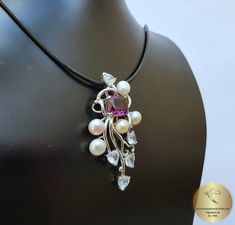 "◎ Beautiful, colorful reacme-shaped pendant. Made from combination of natural gemstones and freshwater pearl in solid sterling 925 silver. With faceted amethyst in the center, surrounded by freshwater pearl in 3 colors ( white, silver and peach ), and white topaz used to emphasize the design. ◎ Dimensions: 5.5 x 3.1 cm ( 2.16 x 1.22\" ) ------------------------------- ◎ Leather cord & chain from the photos are not included. These can be purchased in the shop separately. Selection of sterlin White Pendant Necklaces With Gemstone Accents, White Pendant Necklace With Gemstone Accents, White Amethyst Pendant Jewelry, White Gemstone Fusion Necklace, Fusion Style White Gemstone Necklace, White Fusion Necklace For Anniversary, White Fusion Style Necklace For Anniversary, White Multi-stone Pendant Necklace, White Amethyst Pendant Necklace