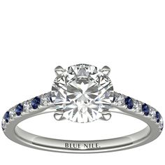 a diamond and blue sapphire engagement ring with the words blue nile on it's side