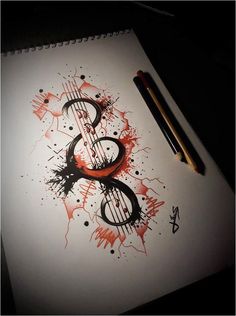 a drawing of the number eight with paint splatters on it and two pencils