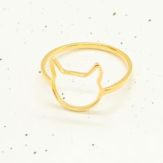 Add a touch of feline elegance to your outfits with my lovely Meow Outline Ring design by FurryBling. This delicate and must-have piece of jewelry is designed for all the fashionable cat moms out there who want to showcase their love for their beloved feline friends. With a sweet cat face outline, my Meow Outline Ring captures the essence of a cat's charm and grace. Its dainty design is perfect for those who appreciate subtle and minimalist aesthetics, allowing you to incorporate your love for cats into your everyday style effortlessly. 🐾 ADDITIONAL DETAILS MATERIALS: Made from sterling silver 925. If you choose 24K gold plated it will be made on a base of sterling silver 925 and plated with 1 micron of 24k gold. All products will be hallmarked 925. SIZES: Ring Size Options: (US Sizes) 4, Cat Face Outline, Line Jewelry, Face Outline, Face Ring, Sweet Cat, Zierlicher Ring, Cat Ring, Cat Charm, Cat Person