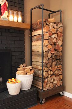 a fire place with logs stacked on top of it