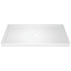 a white shower tray with an oval hole in the middle