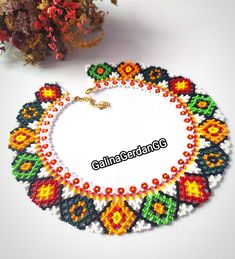 Ожерелье Silyanka круглое украинское яркое бисерное изысканное - Etsy Украина White Beaded Choker For Festivals, Handmade Round Choker For Festivals, Orange Round Bohemian Beaded Necklaces, Handmade Beaded Choker For Festivals, Orange Bohemian Round Beaded Necklaces, Orange Bohemian Beaded Necklaces With Round Shape, Handmade Round Beaded Necklace For Festivals, Orange Round Bohemian Beaded Necklace, Colorful Bohemian Beaded Necklaces