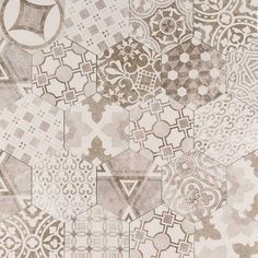 an abstract design with many different shapes and sizes on it's surface, including hexagonal tiles