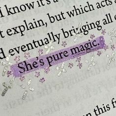 an open book with the words she's pure magic written in purple and white