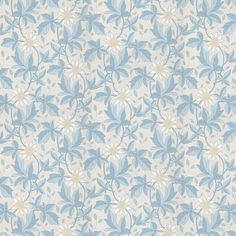 a blue and white wallpaper with flowers on it