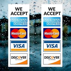 we accept american express and mastercard stickers on a rainy window with raindrops