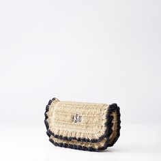 This beautifully constructed crossbody is summer luxury in bag form. Its handcrafted ruffle detailing adds a feminine touch, with a splash of color that complements the adjustable faux leather strap, which can be removed to make it a clutch. Ready for a vacation getaway-or for when you just need to feel a little beachy. A monogram adds a personal touch.    11"w x 3.5"d x 7"h  Adjustable crossbody strap: 41"- 50"  Paper straw and twisted raffia, linen lining, faux leather strap, gold hardware.  Spot clean and store only when completely dry.  Made in India.  Monogramming is embroidered. Summer Luxury, Paper Straws, School Days, 7 H, Crossbody Strap, Belt Bag, Personal Touch, Gold Hardware, Color Splash