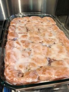 a casserole dish sitting on top of a stove