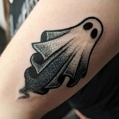 a black and white image of a ghost on the arm