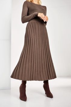 Elegant and modest knit skirt is made of high quality Italian yarn which consists of 60% cotton and 40% viscose The skirt is for spring and summer season Pleated imitation looks eye catching and always trendy - skirt length is 31,4 inches or 80 cm - elastic waist band Sizes  Available in 2 sizes,the recommended measurements are 4/6 US numeric WAIST 26-29 inches or 66-74 cm HIPS 35-38,5 inches or 90-98cm 8/10 US numeric WAIST 30-33 inches or 78-85 cm HIPS 40-43 inches or 102-110 cm RETURNS and EXCHANGES I gladly accept returns, exchanges and cancellations Contact me within: 7 days of delivery Dispatch items back within: 14 days of delivery Request a cancellation within: 6 hours of purchase Conditions of return Buyers are responsible for return postage costs. If the item is not returned in i Knitted Skirts For Women, Brown Knit Skirt, Warm Skirt, Warm Skirts, Midi Pleated Skirt, Skirt For Fall, Midi Skirt Outfit, Womens Knit Tops, Cotton Midi Skirt