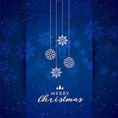 a blue christmas card with snowflakes hanging from strings and the words merry christmas