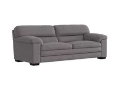 a gray couch sitting on top of a white floor