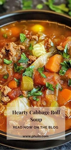 a bowl of hearty cabbage roll soup on the table