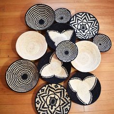 several woven baskets are arranged on the floor