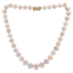 A phenomenal strand of cultured South Sea pearls, draping magnificently in this graduated necklace. Kissed by Mother Nature, it features a lovely assortment of rosé, light golden yellow, and creamy white pearls. Given their impressive size graduating from 10mm to 14mm, the sheen, luster, and important off round organic shapes glow with charm. Recently re-knotted and fitted with a retro 14k yellow gold diamond clasp, this versatile necklace impresses in both casual and professional settings. Condition: Very good; recently re-knotted Era: Contemporary vintage Year: 2000s Metal: 14k Yellow Gold Diamonds: (4) Carat Weight: 0.08 carats total Cut: Round Brilliant 38 South Sea Saltwater Pearls 10mm-14mm Graded by GIA standards Dimensions: Length: 18" Weight: 80.8 grams Includes: Certified Apprais South Sea Pearl Necklace, Akoya Pearl Necklace, Coral Beads Necklace, Contemporary Vintage, Pearl Strands Necklace, Graduation Necklace, Saltwater Pearls, Cultured Pearl Necklace, Fringe Necklace