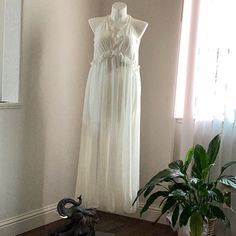 Everyone Needs A White Summer Dress For That White Party. This One Is It. It’s Sheer, Its Beautiful, Its A Maxi And There Is A Under Lining . Walk The Beach In This And All Eyes On You. Size Small. Sheer Halter Neck Maxi Dress For Beach, Spring Sheer Halter Neck Maxi Dress, Feminine Maxi Dress For Beach, Summer Maxi Dress For Party, Sheer White Dress, White Sheer Dress, White Summer Dress, White Dress Summer, White Party