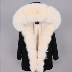 Winter White Parka With Double-lined Hood, Winter White Hooded Jacket With Detachable Hood, Winter White Parka For Cold Weather, Hooded Winter Fur Coat With Faux Fur Trim, Hooded Fur Coat With Faux Fur Trim For Winter, Winter Hooded Jacket With Faux Fur Trim, Winter Hooded Jacket With Faux Fur Trim, Long Sleeve, Winter Long Sleeve Fur Coat With Zipper, Winter White Parka With Detachable Hood For Fall