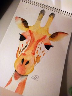 a drawing of a giraffe's face on paper