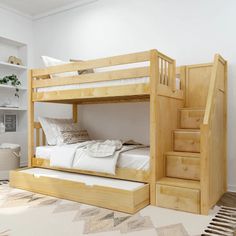 there is a bunk bed with stairs in the room