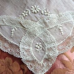 SPECIAL: Purchase 3 or more trims/hankies/collars/Doilies/postcards or buttons and shipping is FREE ! Shipping will be refunded. This item qualifies towards free shipping!! GORGEOUS Vintage French fancy hanky suitable for a bridal wedding handkerchief. This fine hankie has exquisite, intricate and beautiful hand embroidery work and looks like bobbin lace trim, just breathtaking! It measures about 10.75 inches by 11.25 inches, the hanky looks like it was never used, has a very faint water spot which will come out in a quick laundering if desired, otherwise in wonderful gift worthy condition. Would be very pretty to frame or make a wonderful heirloom quality gift for the bride or bridal party or any other special occasion. Small enough to be slipped into a greeting card. Please do view our o Elegant Wedding Lace Fabric And Notions, Elegant Wedding Fabric With Lace Work, Lace Handkerchiefs With Lace Trim For Wedding, Lace Wedding Handkerchiefs With Lace Trim, Cream Lace Trim Handkerchiefs For Wedding, Cream Handkerchiefs With Lace Trim For Weddings, Elegant Lace Wedding Handkerchief, Elegant Wedding Handkerchief With Lace Work, Cream Wedding Handkerchiefs With Lace Trim