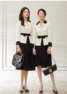 Look no further than these Elegant Black and Cream Skirt Suits for the perfect combination of professionalism and chic elegance. The perfect workwear for the modern woman, these suits offer ultimate sophistication and unsurpassed comfort. Buy now and look your best for any business or social occasion. Peak lapels; front button blazer V-Neck, Long sleeves; Structured shoulders. Blazer and Pant Polyester 94% Spandex 6% Lining: Polyester 100% Imported Brand - AD&KM® Model Number - S1510, S13127, C1 Elegant Midi Skirt Suit, Luxury Elegant Business Skirt, Luxury Black Sets For Business Occasions, Skirt Suits For Women Classy, Suits For Women Classy, Skirt Suits For Women, Cream Skirt, Skirt Suits, Woman Suit Fashion