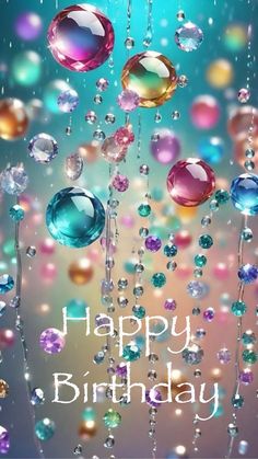 an image of happy birthday card with bubbles and beads on the water droplets in the sky