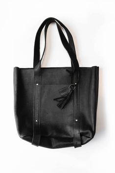 The Product: Meet our customers’ all-time favorite product! The Large Raw Leather Tote works perfectly for work, school, or as a mom bag. It has both an external pocket perfect for things like a phone and keys and an equally useful internal pocket as well. The little sister to our XL Raw Leather Tote, the Large tote bag is about 2 inches smaller all around. So if you like to carry A LOT of stuff around at once, you might want to upgrade to the XL! The Story: All of our leather- whether it is fro Classic Leather Backpack With Double Handle, Classic Leather Backpack With Double Handle For Everyday, Classic Leather Double Handle Backpack, Leather Backpack With Cell Phone Pocket For Daily Use, Everyday Satchel With Cell Phone Pocket, Everyday Canvas Satchel With Cell Phone Pocket, Leather Tote Bag With Cell Phone Pocket, Leather Work Bags With Cell Phone Pocket, Leather Work Bag With Cell Phone Pocket