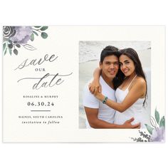 a wedding save the date card with an image of two people hugging each other