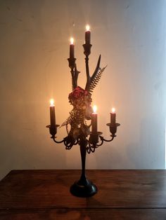 a candelabra with six candles in it