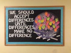 a blackboard with colorful hand prints on it that says we should accept differences until differences make no difference