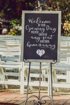 a chalkboard sign that says welcome to our wedding day