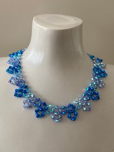 Blue Crystal Jewelry With Colorful Beads, Elegant Blue Choker With Colorful Beads, Blue Crystal Beaded Necklaces For Jewelry Making, Blue Crystal Necklaces With Colorful Beads, Blue Crystal Necklace With Colorful Beads, Handmade Blue Crystal Beaded Necklaces, Handmade Blue Crystal Choker Necklace, Blue Crystal Choker Necklace Gift, Crystal Choker