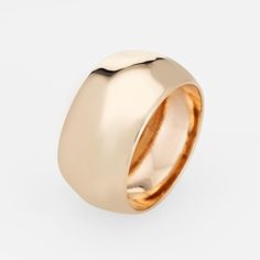 This is part of Chairish’s Fine Jewelry assortment.  Stylish vintage wide band (circa 1980s) crafted in 14 karat yellow gold.   The unique wide 10mm (0.39 inches) ring features a raised ridge to the centre of the band. Great worn alone or stacked with your fine jewellery from any era.    The ring is in very good condition and was recently cleaned and polished.   Particulars:  Weight: 9.2 grammes  Stones:  N/A.  Size & Measurements: The ring is a size 6 (sizable). The band measures 10mm wide (0.3 Classic 14k Yellow Gold Wide Band Ring, 14k Yellow Gold Wide Band, Vintage Wide Band Yellow Gold Jewelry, Vintage Engraved Wide Band Jewelry, Vintage Thick Band Hallmarked Jewelry, Late 20th Century, Wide Bands, Fine Jewelry, Yellow Gold