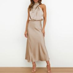 New Chic Draped Halter Satin Midi Dress * Sleeveless * Draped Halter High Neck * Slight Blouson Style Top * High Waist * Slight Flare Bottom Midi Skirt *Approximate Unstretched Measurements* Xs (2) * Bust 34.25" * Waist 22.25"(Up To 26") * Hip 37" * Length 47.25" Small (4) * Bust 35.75" * Waist 24"(Up To 27.5") * Hip 38.5" * Length 48" Medium (6) * Bust 37.25" * Waist 25.5"(Up To 29") * Hip 40.25" * Length 48.75" Large (8/10) * Bust 39.75" * Waist 28"(Up To 31.5") * Hip 42.5" * Length 49.5" Xl ( Sleeveless Outfit, Elegant Maxi Dress, Satin Bridesmaid Dresses, Sleeveless Long Dress, فستان سهرة, Maxi Robes, Hem Design, Hip Dress, Women Long Dresses