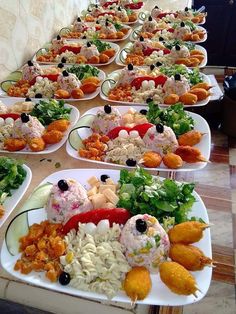 several plates filled with different types of food