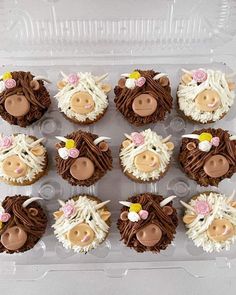 twelve cupcakes in the shape of farm animals