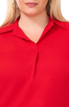 Feel the polish of this fluid collared top that's perfect from desk to dinner. 27" front length; 29 1/2" back length (size 2X) Johnny collar Long sleeves with button cuffs 100% polyester Machine wash, tumble dry Imported Red Collar Blouse For Work, Red Collared Office Blouse, Classic Red Tops With Collared Neckline, Red Collared Blouse For Work, Formal Tops With Collared Neckline And Placket, Formal Solid Tops With Placket, Red Spread Collar Top For Formal Occasions, Red Collared Blouse For Formal Occasions, Red Formal Top With Spread Collar