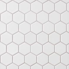 the white hexagonal tile pattern is shown in close up, it looks like hexa