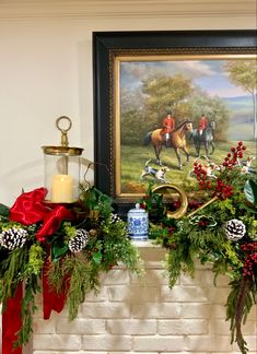 a fireplace decorated for christmas with holiday decorations