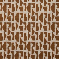 a brown and white pattern on fabric