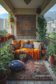 the balcony is decorated with potted plants and an orange blanket on it's back