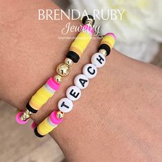 two bracelets that say teach and bead with beads on each one side, the words teach are written in white letters