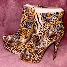 Animal Print Ankle Booties With Side Zipper Size 10 4’ Heel Brand New (Never Worn) Leopard Print Closed Toe Heels For Fall, Fall Leopard Print Closed Toe Heels, Leopard Print Boots With Round Toe For Party, Leopard Print Round Toe Boots For Party, Leopard Print Round Toe Heels For Fall, Fall Leopard Print Heels With Round Toe, Leopard Print High Heel Boots For Party, High Heel Leopard Print Heels For Fall, Fall Leopard Print High Heel Shoes