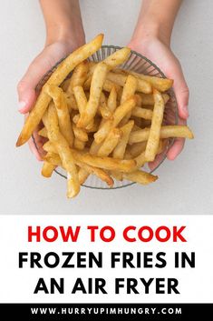 two hands holding a bowl full of fries with the words air fryer frozen french fries