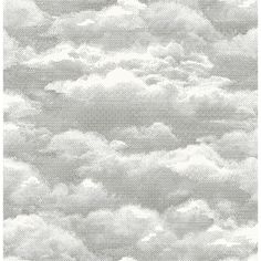 the sky is filled with white clouds in this black and white photo from an airplane