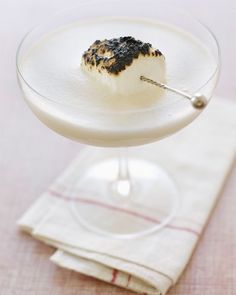 a small dessert in a glass dish on a table