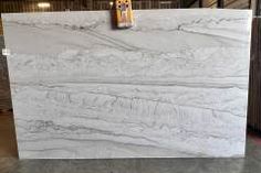 a white marble counter top in a warehouse