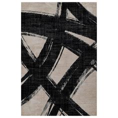 a black and white rug with an abstract design